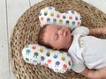 Анатомічна подушка для немовляти: в чому її переваги